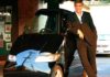 George Clooney with his Tango Electric Car