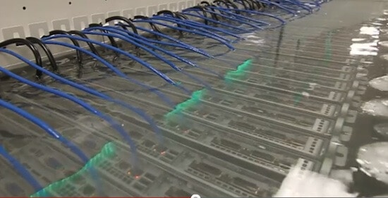 computer servers submerged in mineral oil