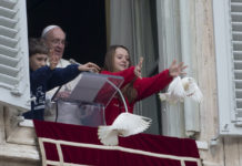 Pope Francis releasing Peace doves