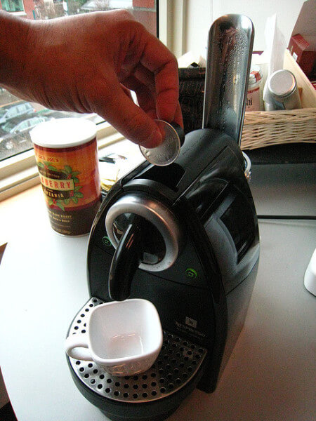 making espresso with a coffee pod
