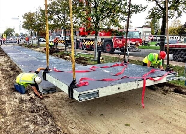 solar powered bike lane being installed in the Netherlands