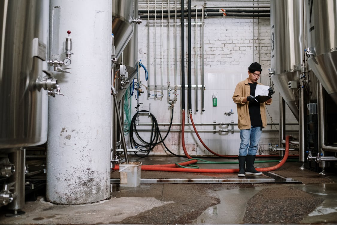 woman standing by flow measurement